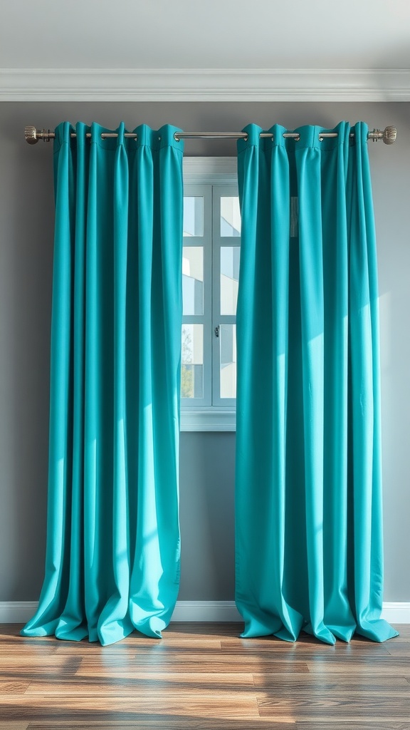 Bright aqua curtains hanging by a window with grey walls